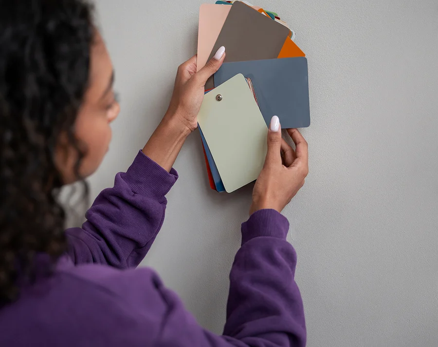 Person with paint samples